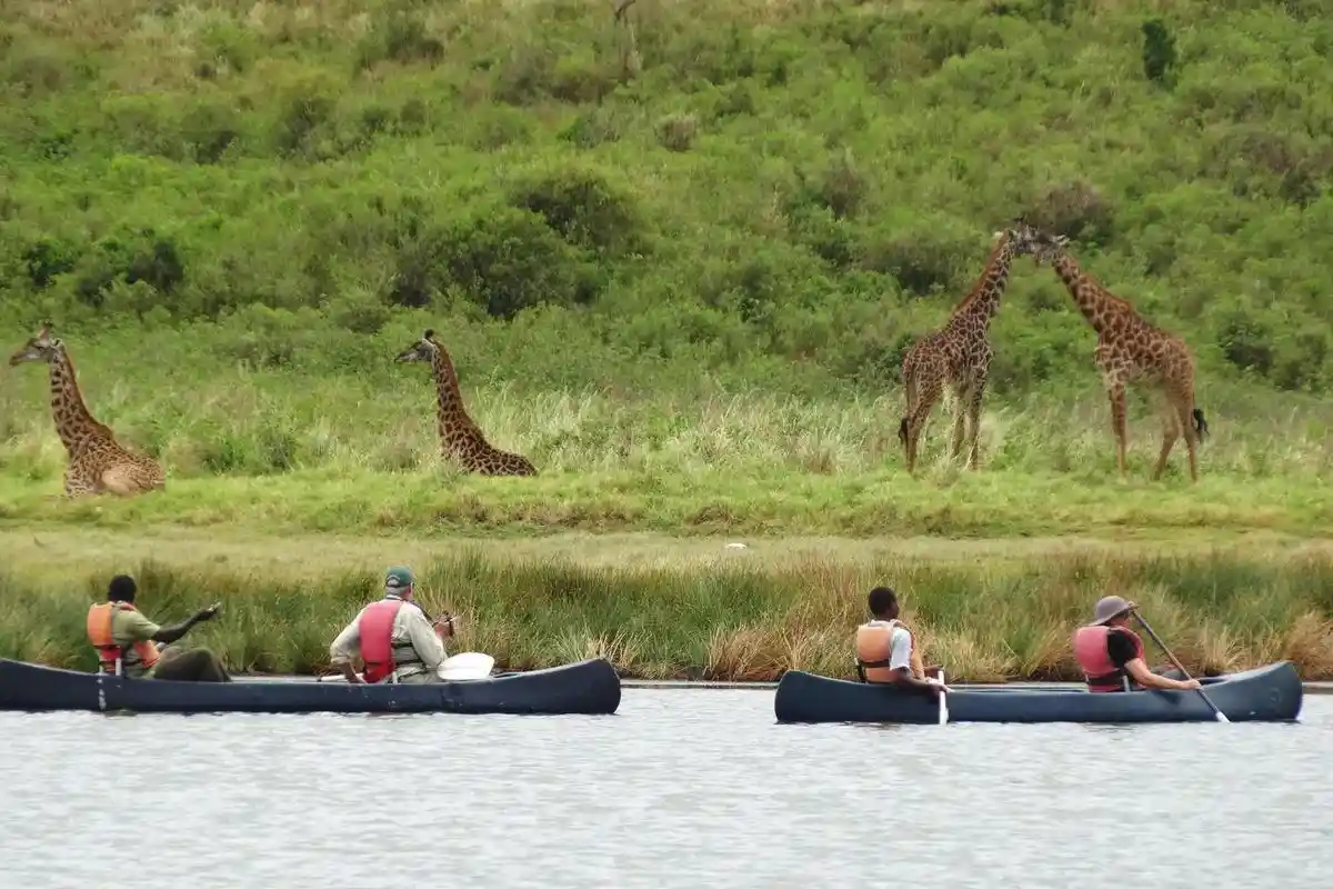 A panoramic view of Arusha National Park, showcasing the beauty of Lake Duluti during a day trip.